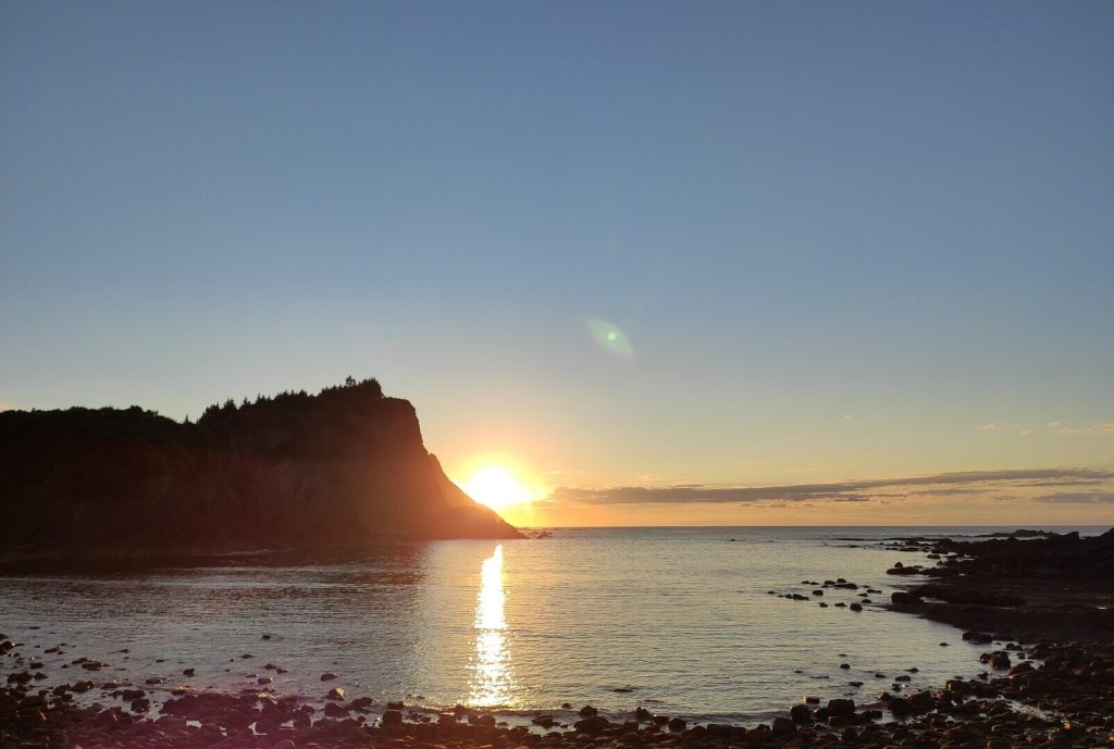 URA playa atardecer